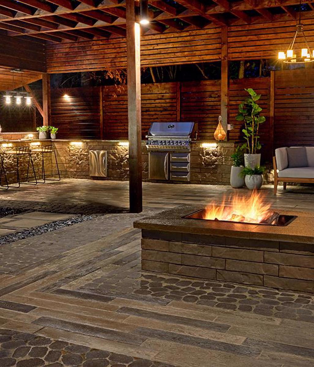 Techo bloc by style backyard patio firepit slabs walls caps brown rustic 7